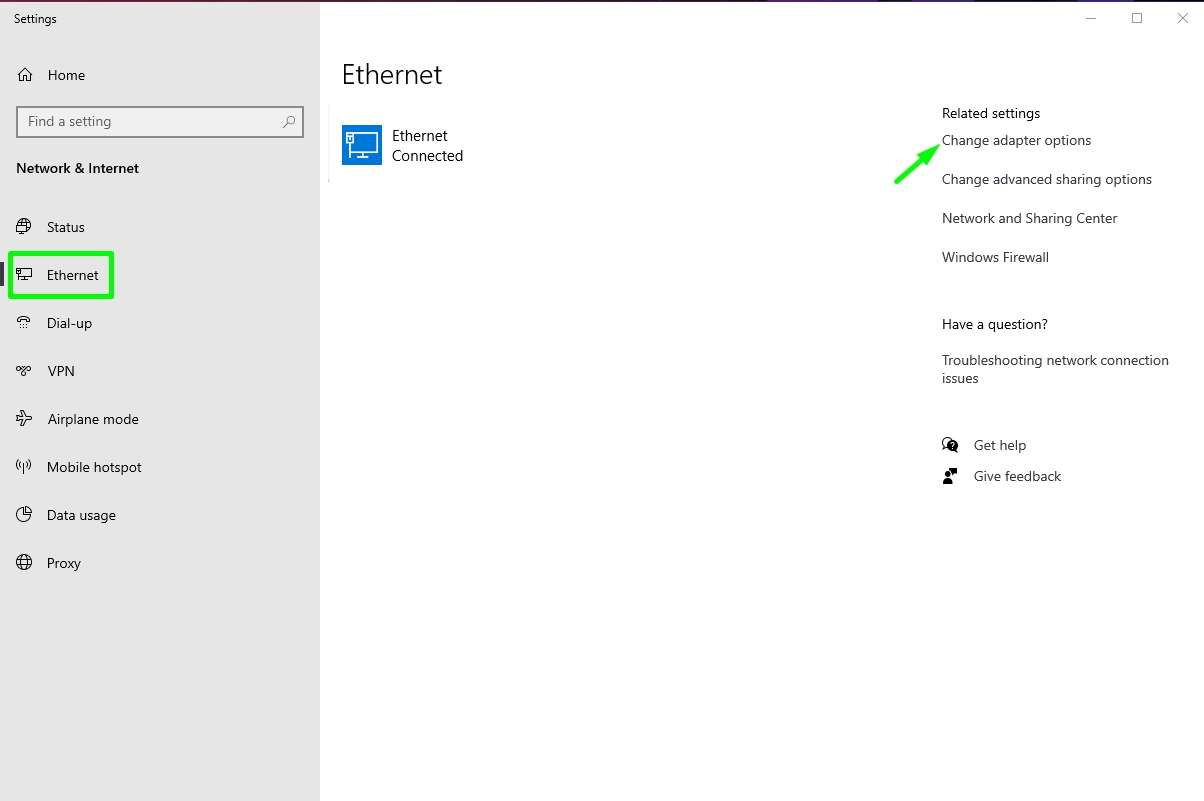 Arrows point to menu options to Change adapter settings in Windows 10